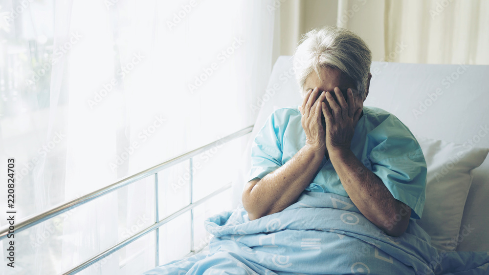 Lonely Elderly patients in hospital bed patients want to go home - medical and healthcare concept - obrazy, fototapety, plakaty 