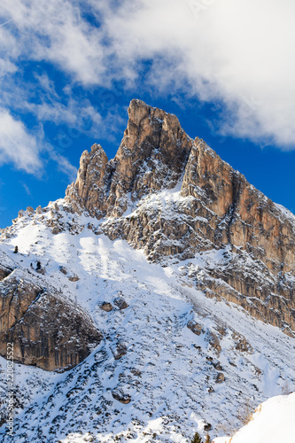 Magical dolomites mountains with white sun and snow