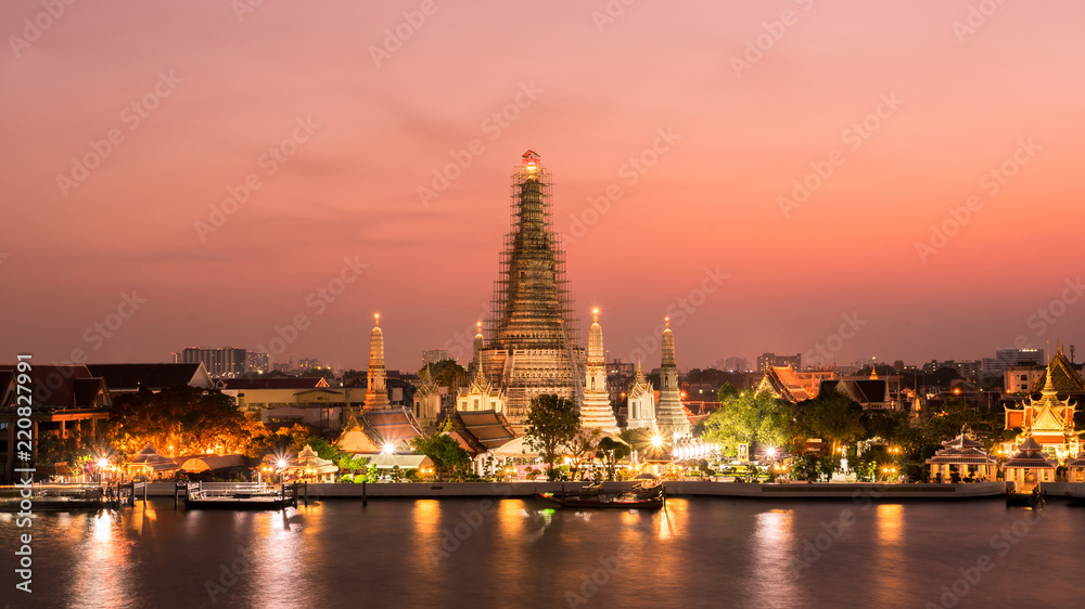 beautiful sunset wat arun temple chao phraya river, landscape Bangkok Thailand