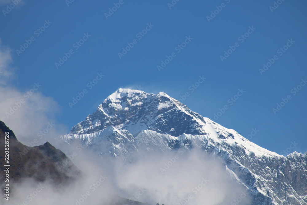 Amazing Shot of Nepalese himalayas mountain peaks covered with white snow attract many climbers and mountaineers