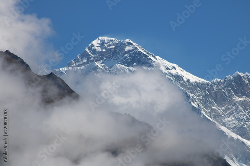 Amazing Shot of Nepalese himalayas mountain peaks covered with white snow attract many climbers and mountaineers