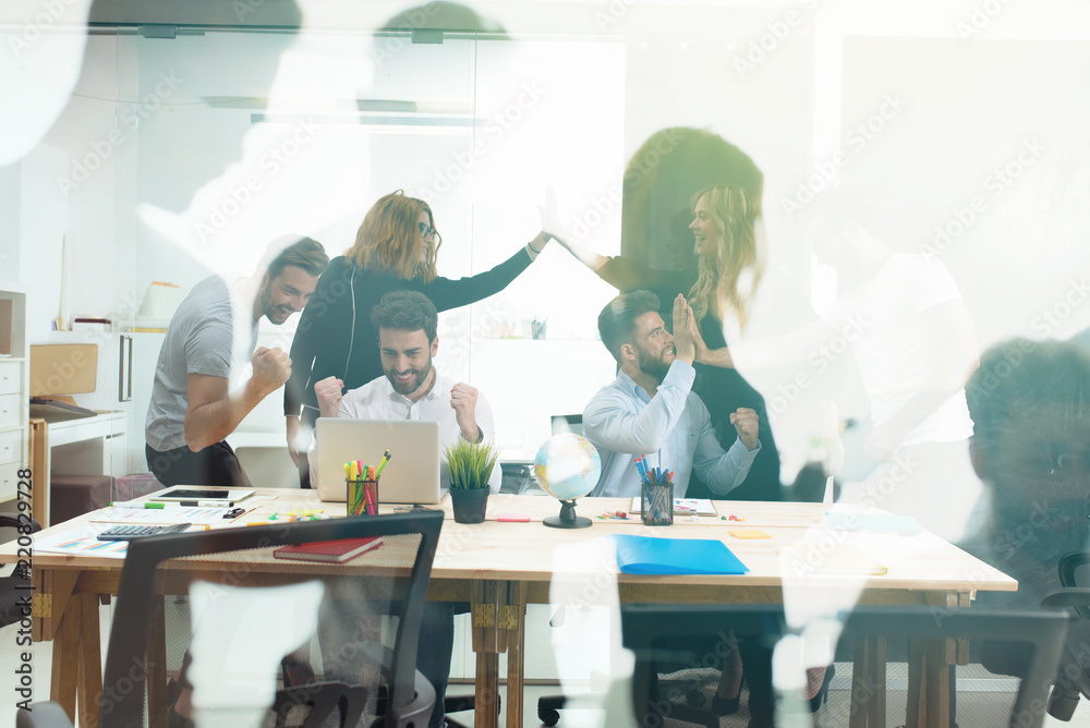 Handshaking business person in the office. concept of teamwork and business partnership. double exposure Handshaking business person in the office. concept of teamwork and business partnership. double exposure