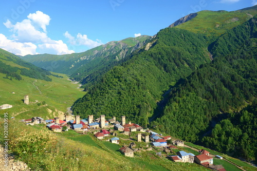Typical old Svanetian village Adishi on a hiking trail leading from Mestia to Ushguli, Georgia photo