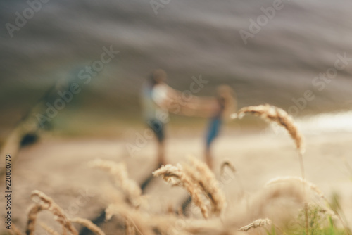 blurred photo of cute couple is running