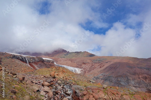 Landscape of Gergeti glacier on a hiking trail leading to mount Kazbek, Stepantsminda, Georgia