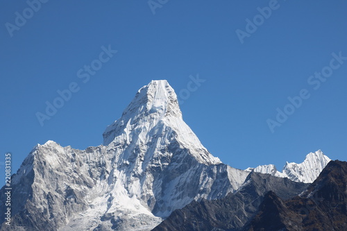 Wonderful view of mountain Ama Dablam in the Mount Everest range, iconic peak of Everest trekking route, eastern Nepal