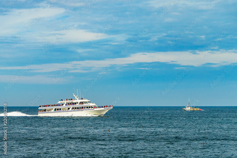 Ship and boat looking for a whale Provincetown, Cape Cod, Massachusetts, US