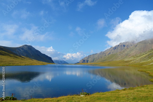 Black Rock Lake with reflections of surrounding mountains in Lagodekhi national park located in Caucasus mountains, Northern Georgia © Tom