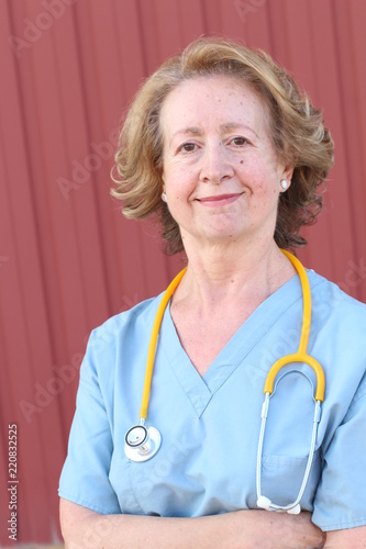 Older nurse close up isolated