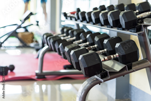 exercise weights in fitness gym, focus on exercise weights