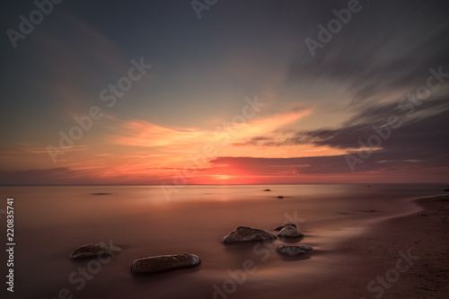 Beach sunset, Karkle, Klaipeda, Lithuania photo