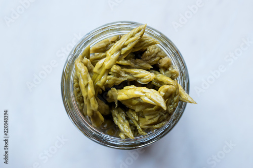 Pickled Green Asparagus Pickles Fermented and Preserved in Glass Bottle Jar