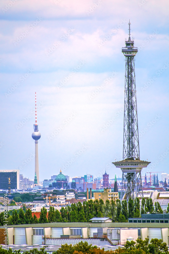 View over downtown Berlin with "Funkturm" (radio tower), "Fernsehturm" (TV  tower), "Rotem Rathaus" (Red Townhall) and various other sights. Photos |  Adobe Stock