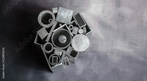 Different metal profiles on gray background