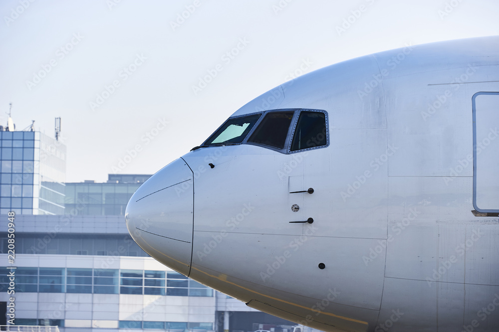 Traffic at the airport. Airplane is taxiing to the runway. Traffic at the airport. Airplane is taxiing to the runway.