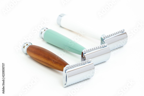 Traditional steel razor isolated in white