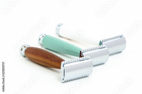 Traditional steel razor isolated in white