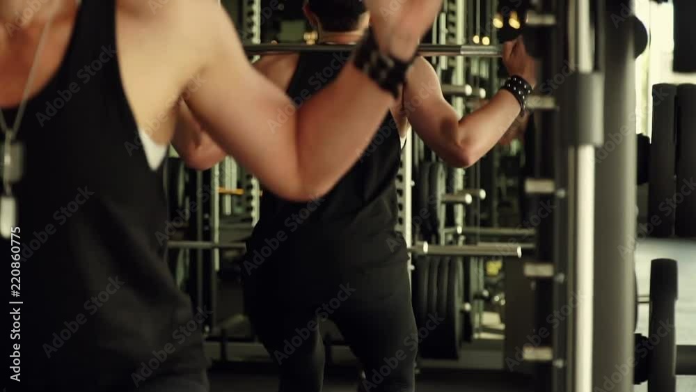 Sporty girl doing sit-ups workout in the gym