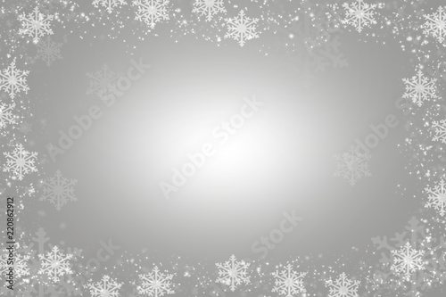 Snowflakes as a border on a Gray background with snowflakes
