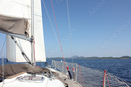 Sailboat In Blue Water