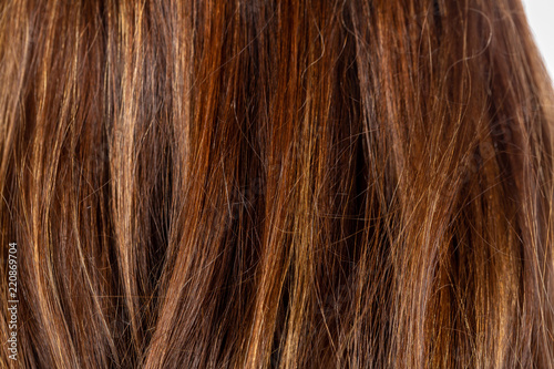 Wavy hair of a brunette girl