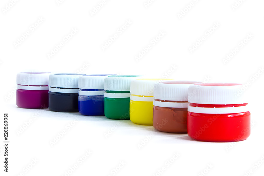 rainbow paints in jars on an isolated white background rainbow paints in jars on an isolated white background