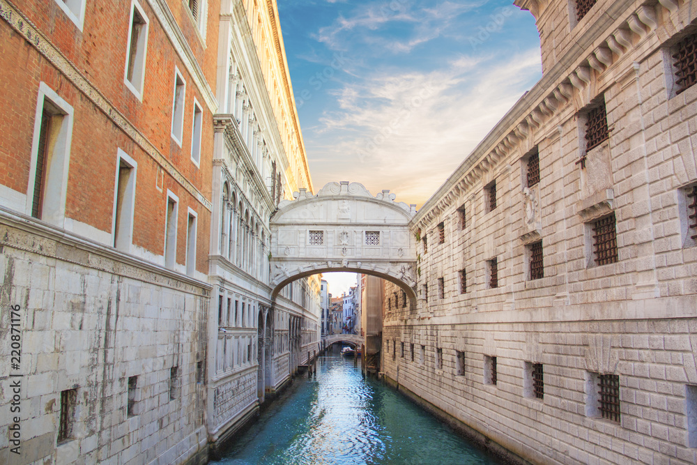 Beautiful view of the Bridge of sighs over one of the Venetian canals in Venice, Italy