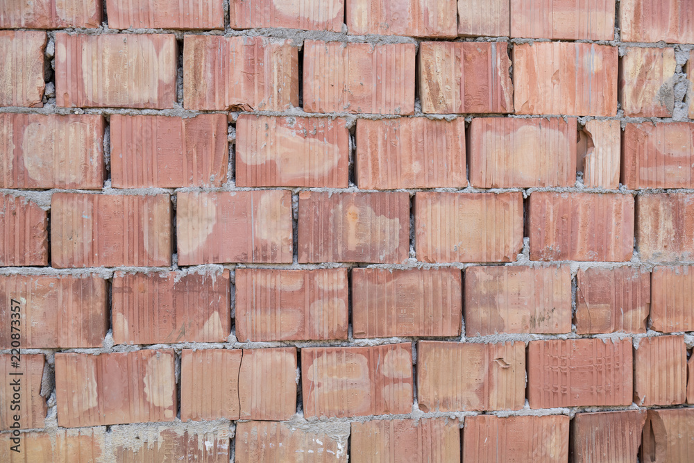 Obraz premium Irregular Red Brick Wall Background