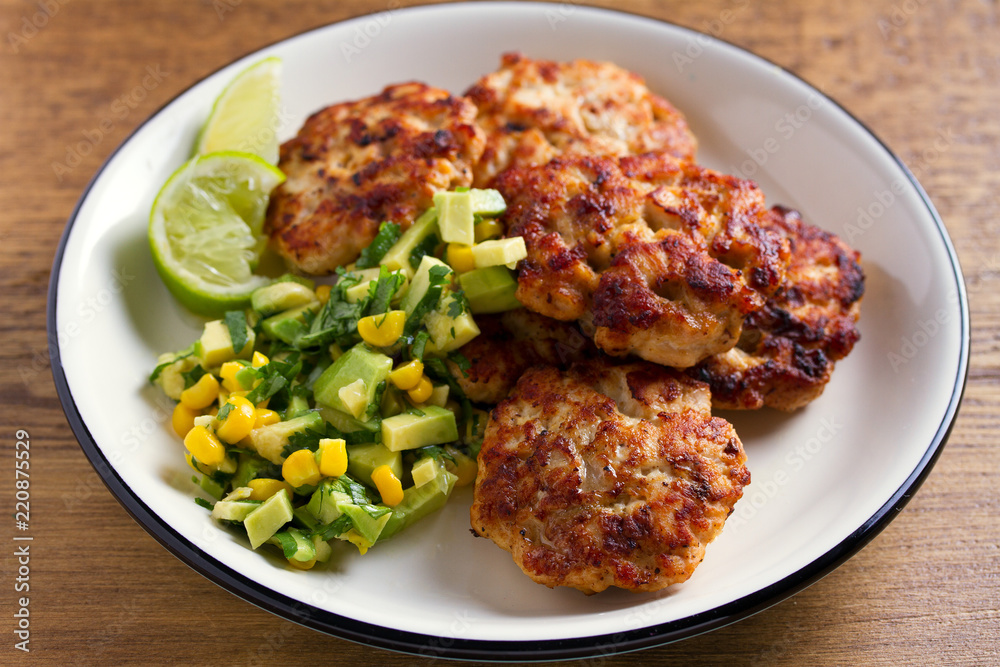 Chicken patties or burgers with avocado corn salsa Chicken patties or burgers with avocado corn salsa