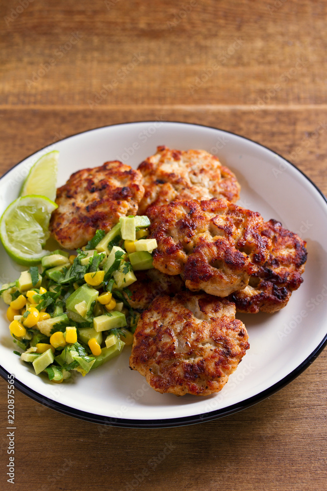 Chicken patties or burgers with avocado corn salsa Chicken patties or burgers with avocado corn salsa
