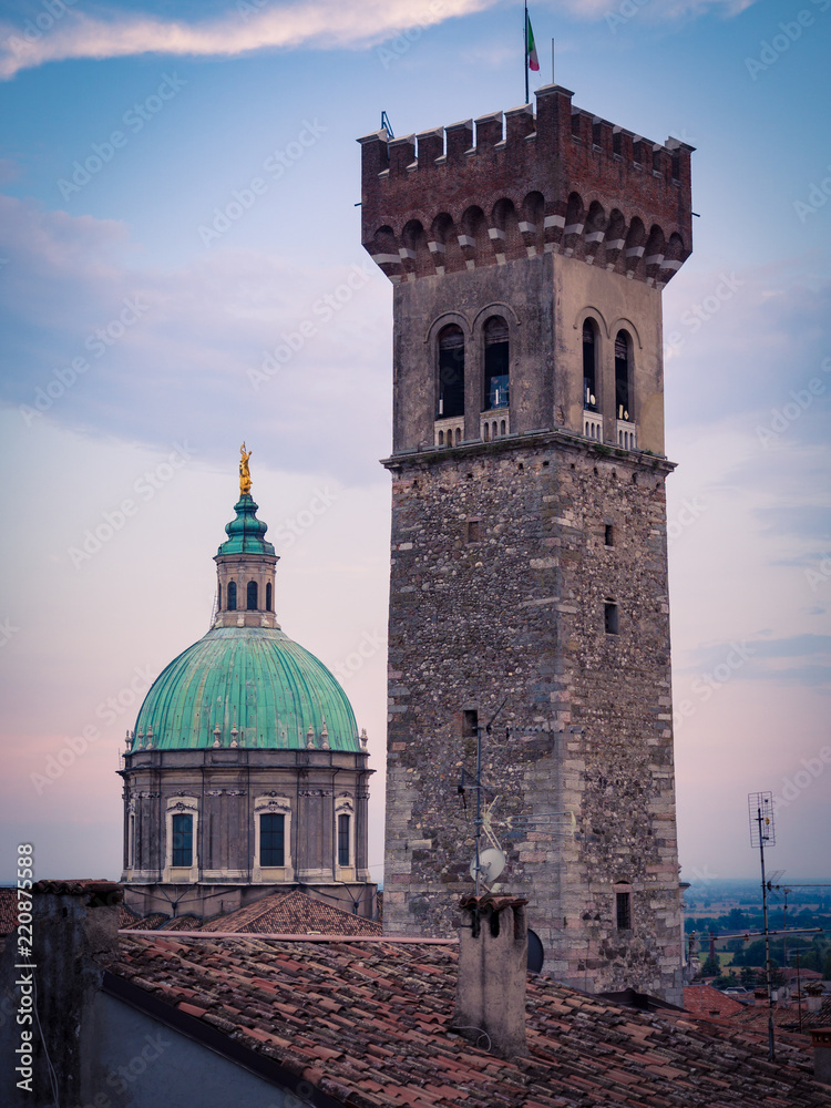 View of the medieval tower and the dome of the Cathedral in Lonato, Italy.