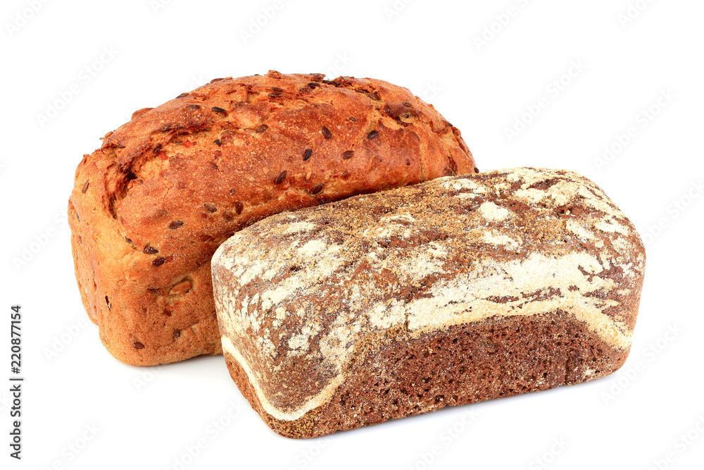 Two breads of wheat and rye flour isolated. Two breads of wheat and rye flour isolated.