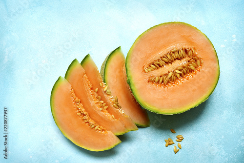 Raw organic tuscan melon cantaloupe.Top view with copy space.