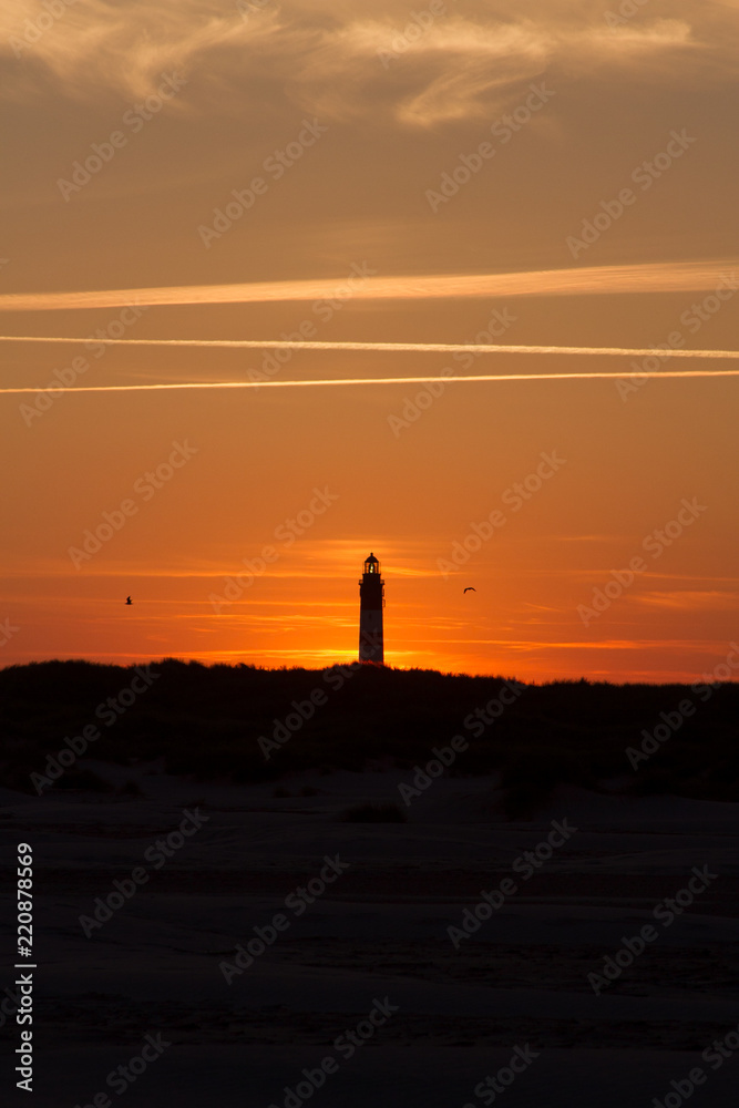 Sunset behind lighthouse