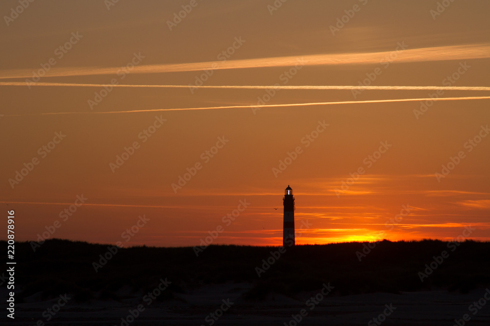 Sunset behind lighthouse Sunset behind lighthouse