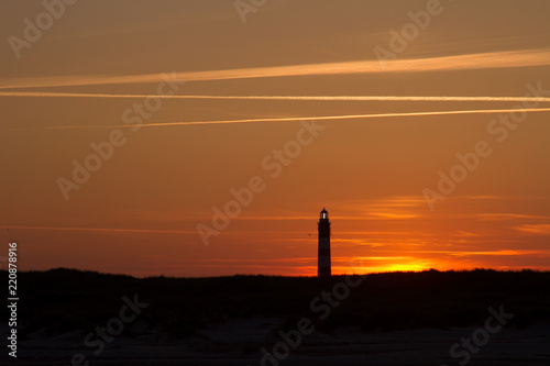 Sunset behind lighthouse