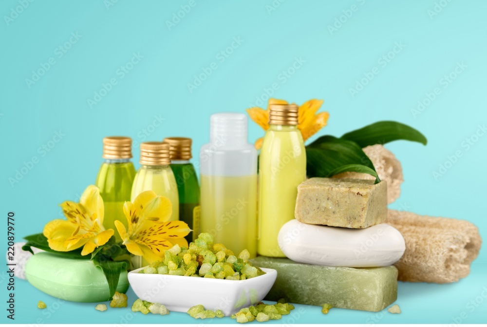 Bottles with organic essential aroma oils on background Bottles with organic essential aroma oils on background