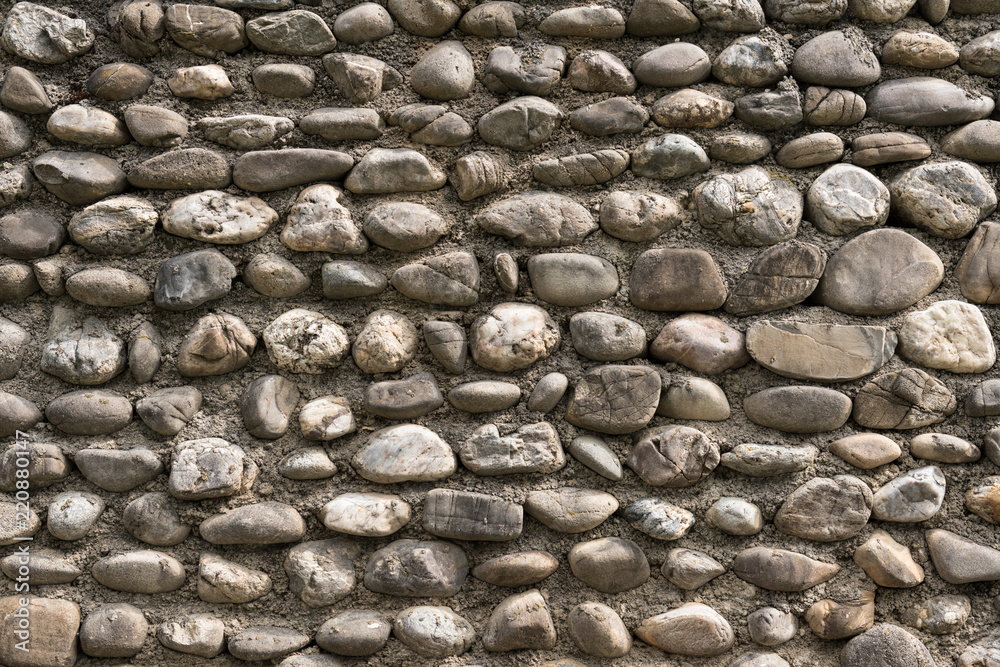 Old round stone wall background
