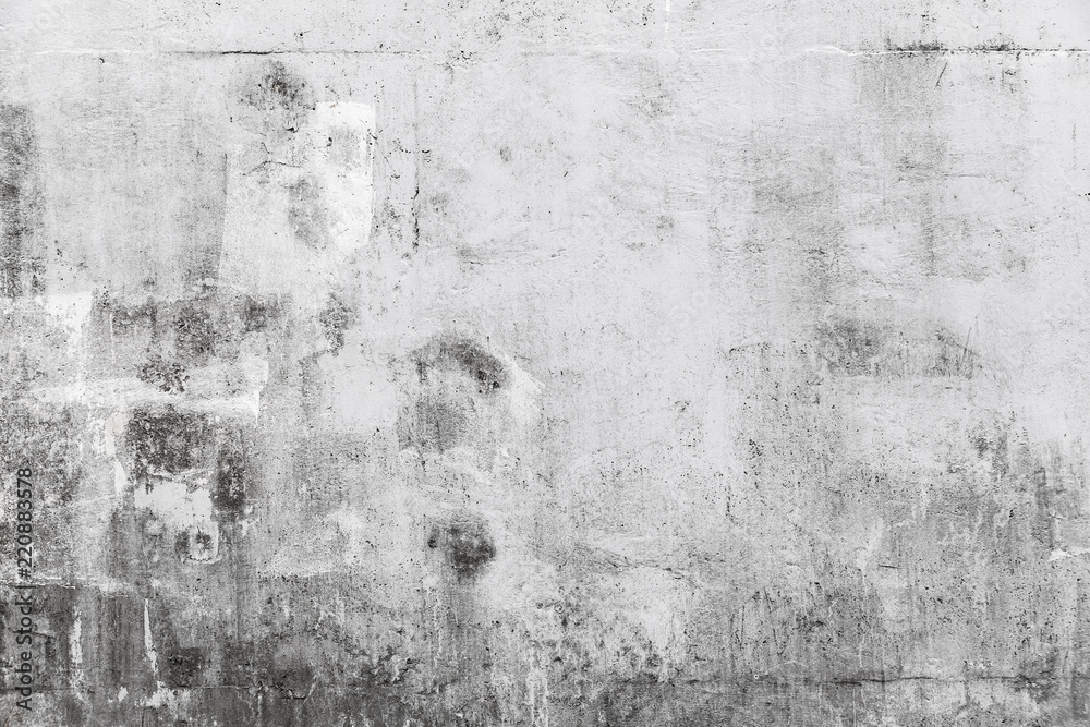 Obraz premium Grungy concrete wall with white paint brush strokes