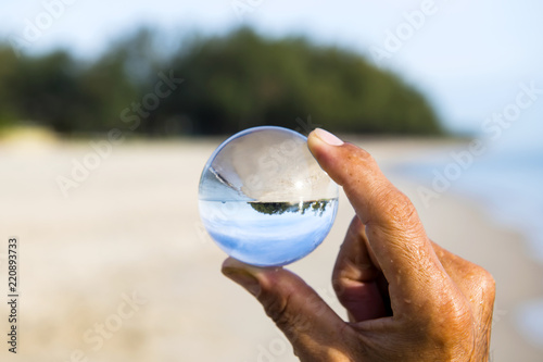 glass ball crystal clear that reflects the view in the morning