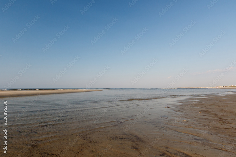 Tidal pool and waves on the Atlantic Ocean, Sunset Beach, North Carolina Tidal pool and waves on the Atlantic Ocean, Sunset Beach, North Carolina