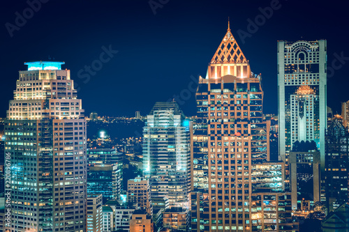 landscape scenery of buildings and skycrapers in the central business area of Bangkok city at nigjt