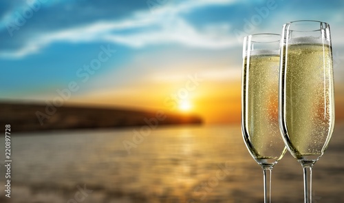 Two glasses of champagne isolated on white background