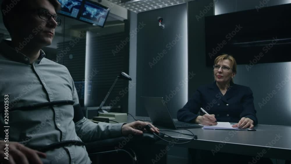 Female Special Agent Conducts Lie Detector / Polygraph Test on a Young ...
