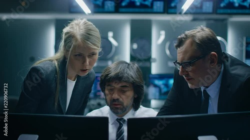 Wallpaper Mural Male and Female Operators Working On Computers in System Control Room. Secret Government Agency Analysts Doing Research, Conducting Cyber Security Investigation. Torontodigital.ca
