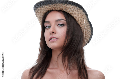 Portrait of a beautiful young woman in cowboy hat