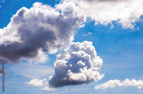 Cumulus clouds and blue skies. photo