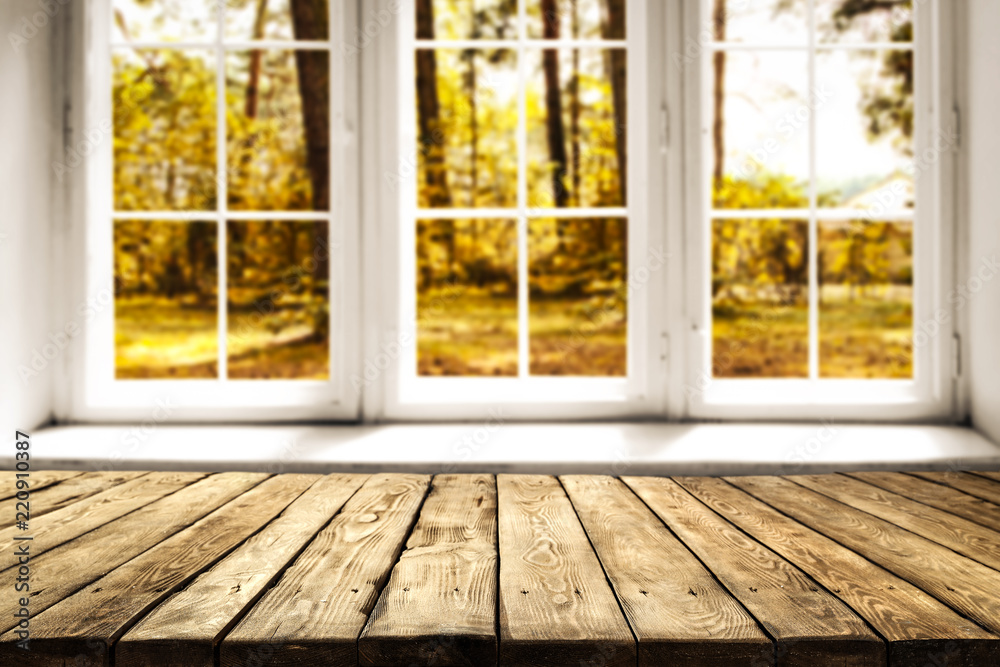 table of free space for your decoration and autumn window background table of free space for your decoration and autumn window background