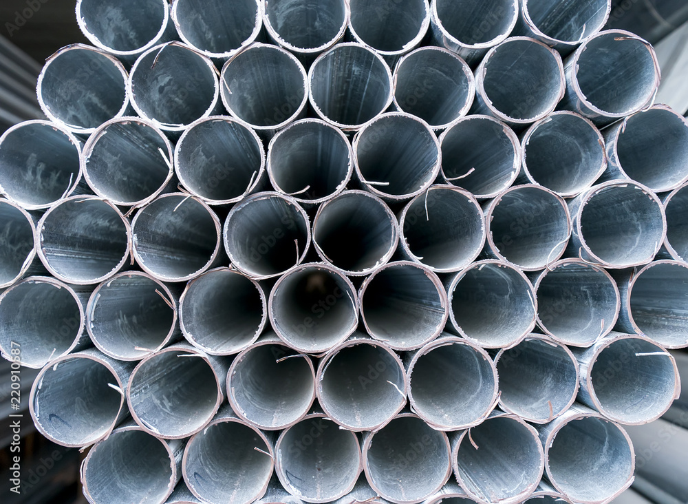 Steel Pipes Industry Construction stacked in Factory warehouse Steel Pipes Industry Construction stacked in Factory warehouse