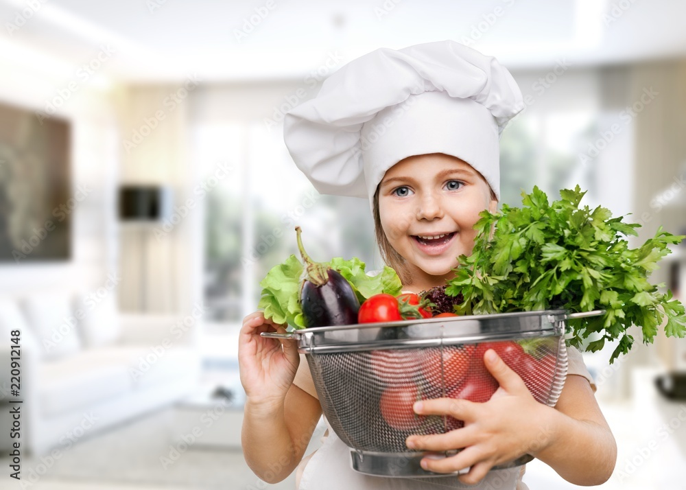 Portrait of adorable little girl with  food